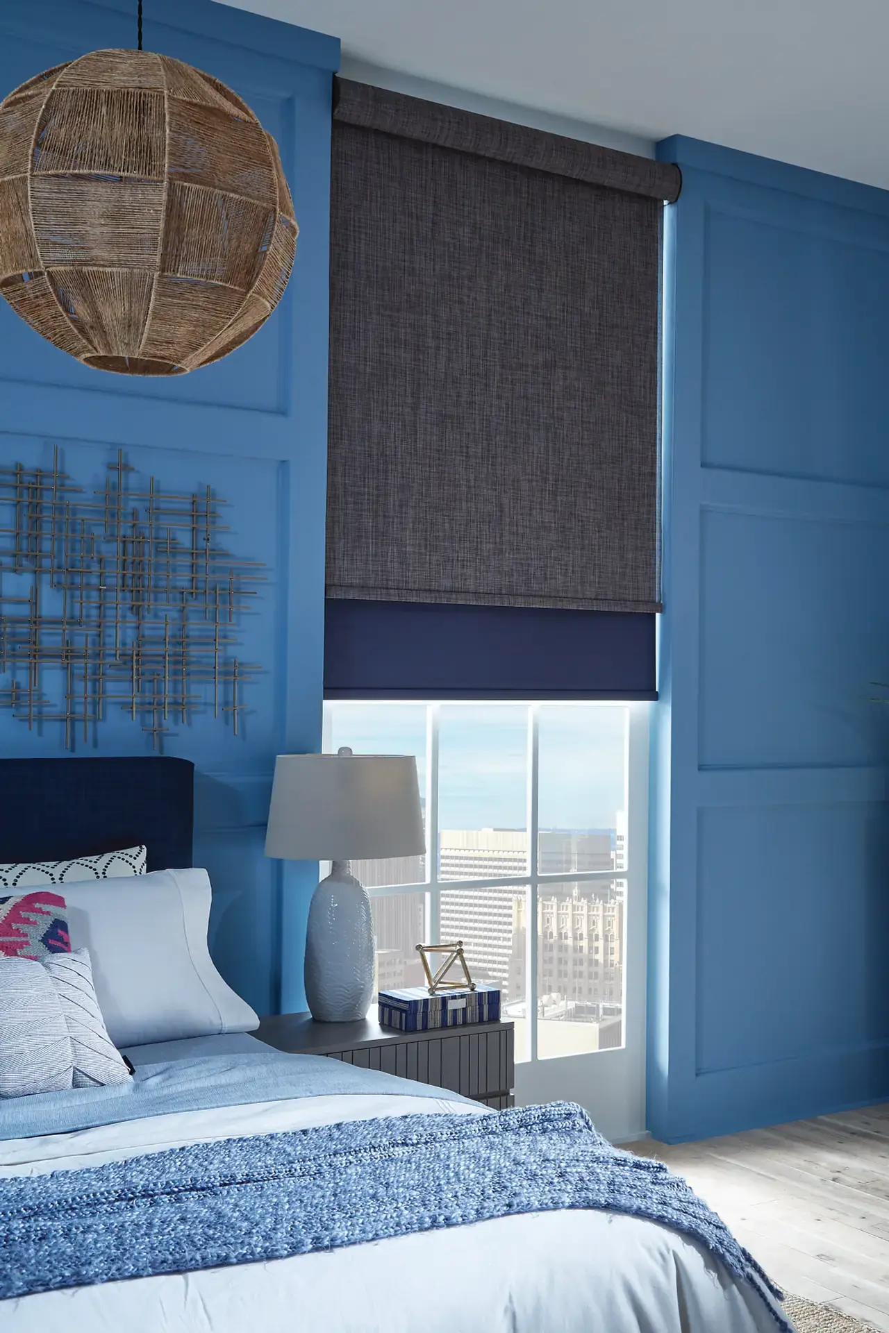 Solar shade filtering bright sunlight while showing view to the outside