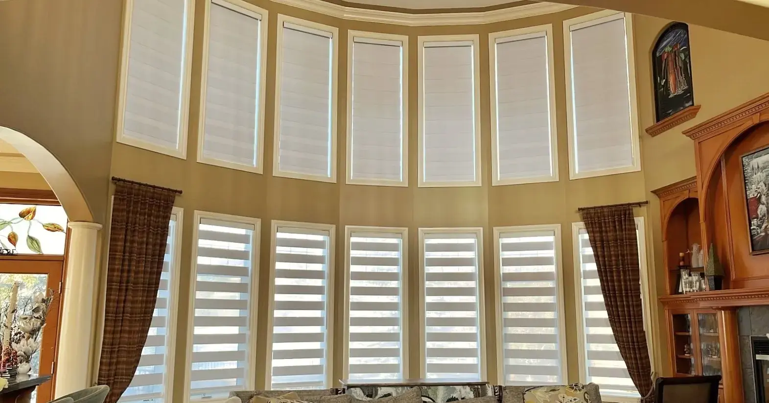 Zebra blinds shown in different positions demonstrating light control versatility